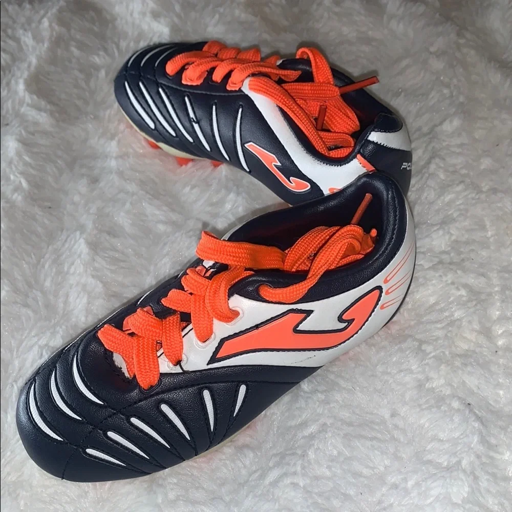 Kids Black and Orange Soccer Shoes like new